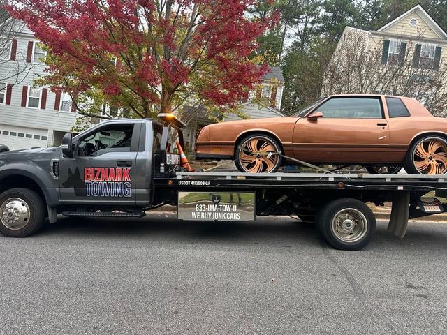 Biznark Towing a car in the Alpharetta, GA area