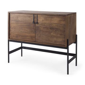 Wooden cabinet with two doors and black metal legs.