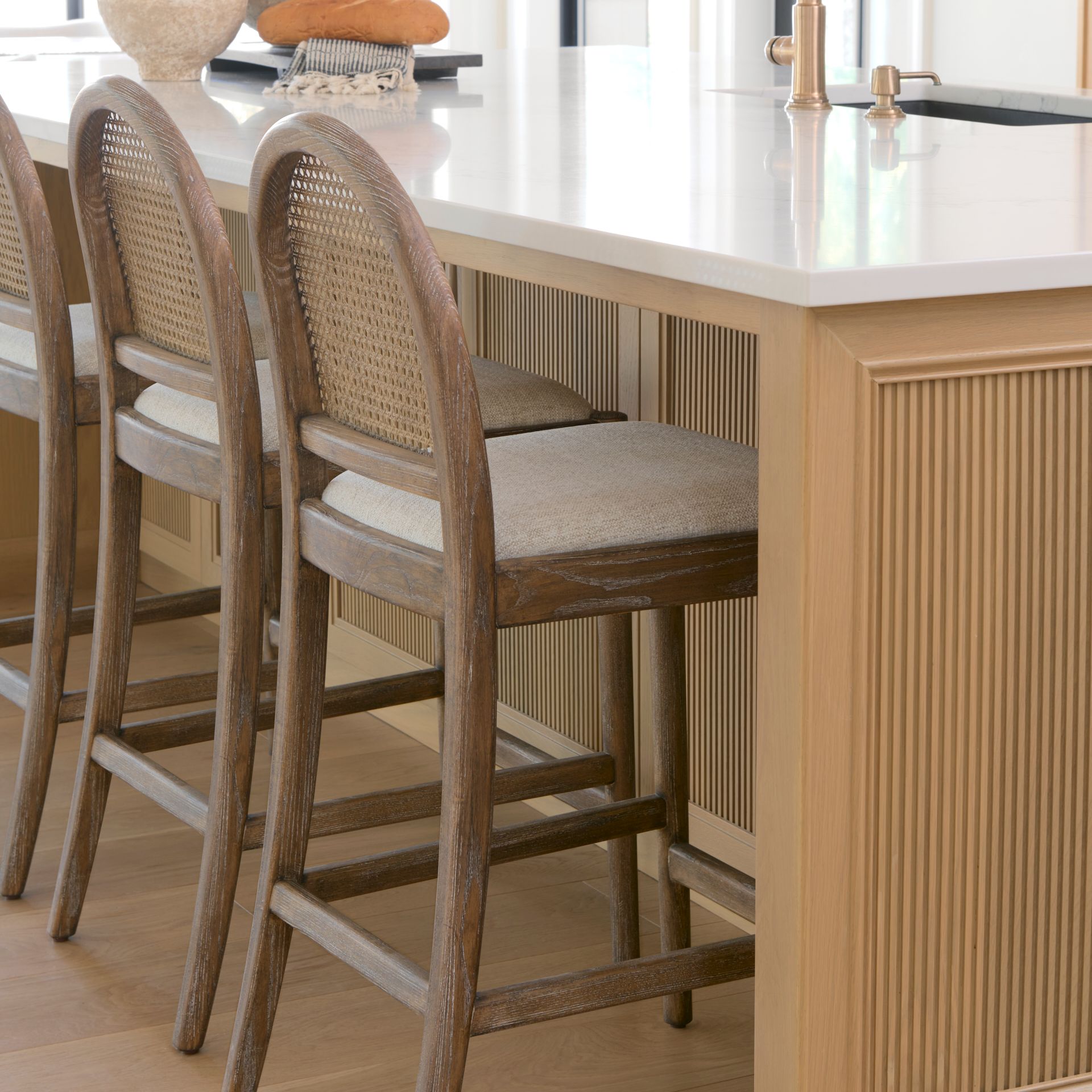 Three wooden bar stools