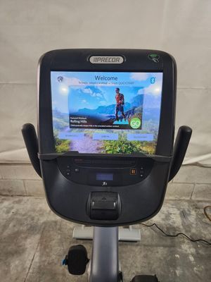 A bicycle with a large screen on the front of it.