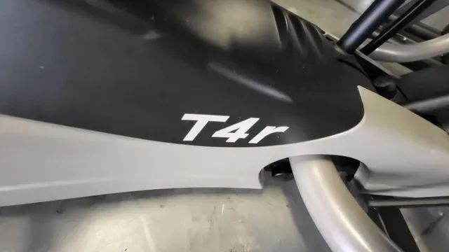 The word t4r is on the side of a motorcycle