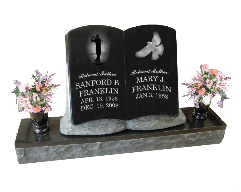 Black double headstone with engraved portraits and a flower vase on a marble base