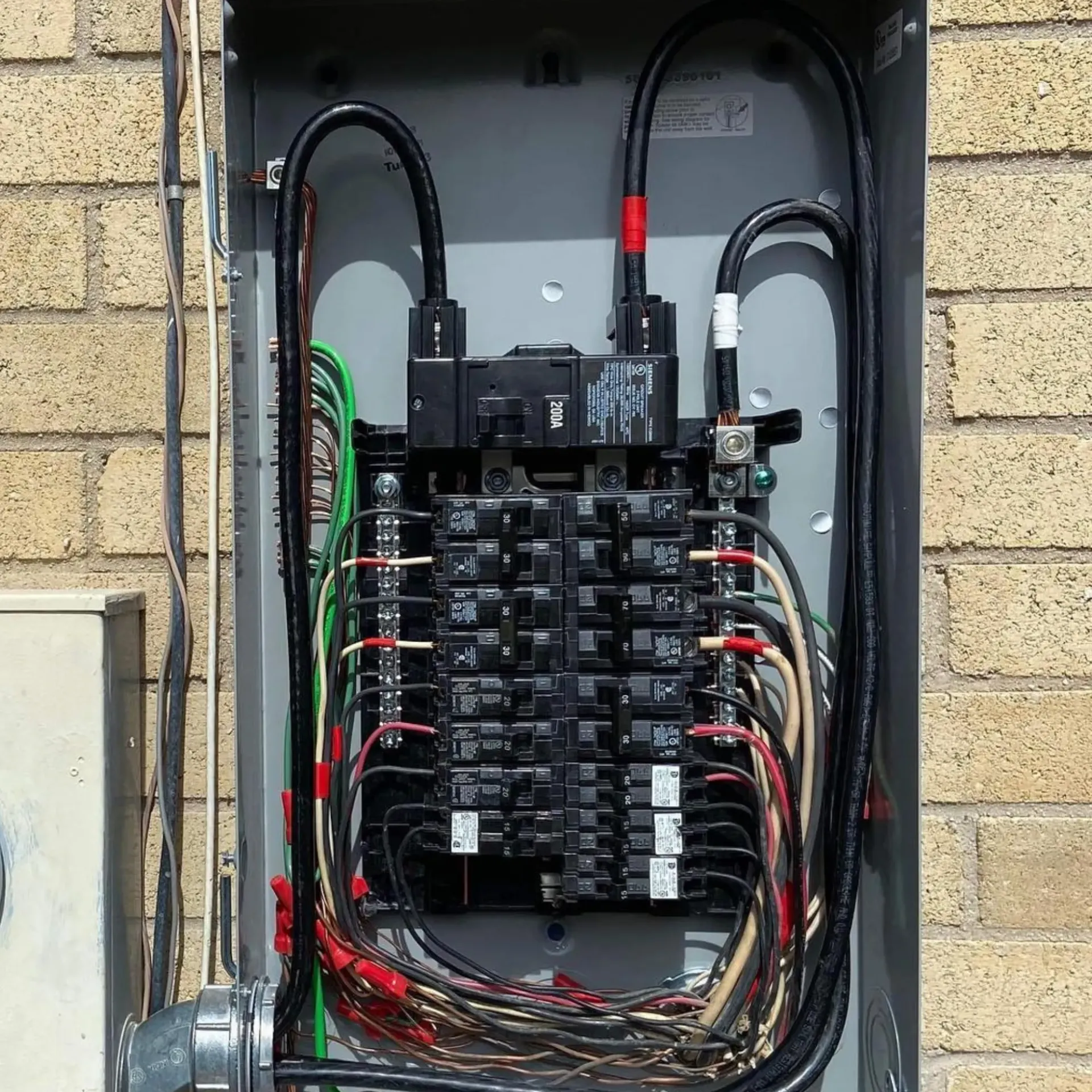 Panther City Electric LLC - An electrical box with a lot of wires coming out of it