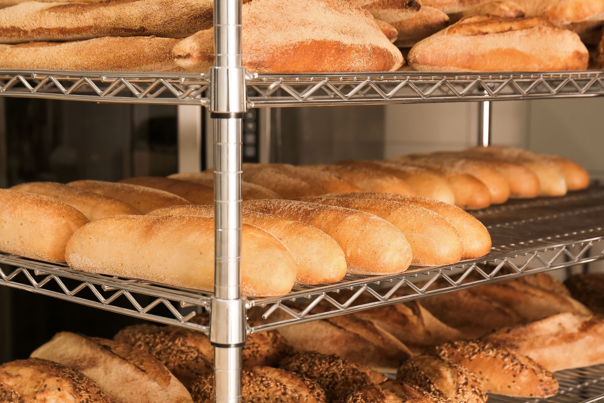 Shelves with fresh bread in a bakery.