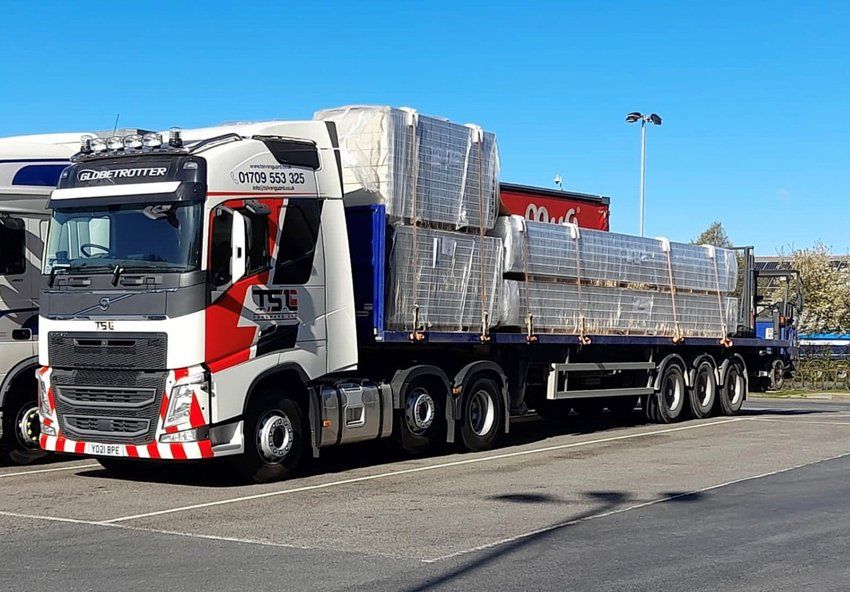 Truck with flatbed trailer