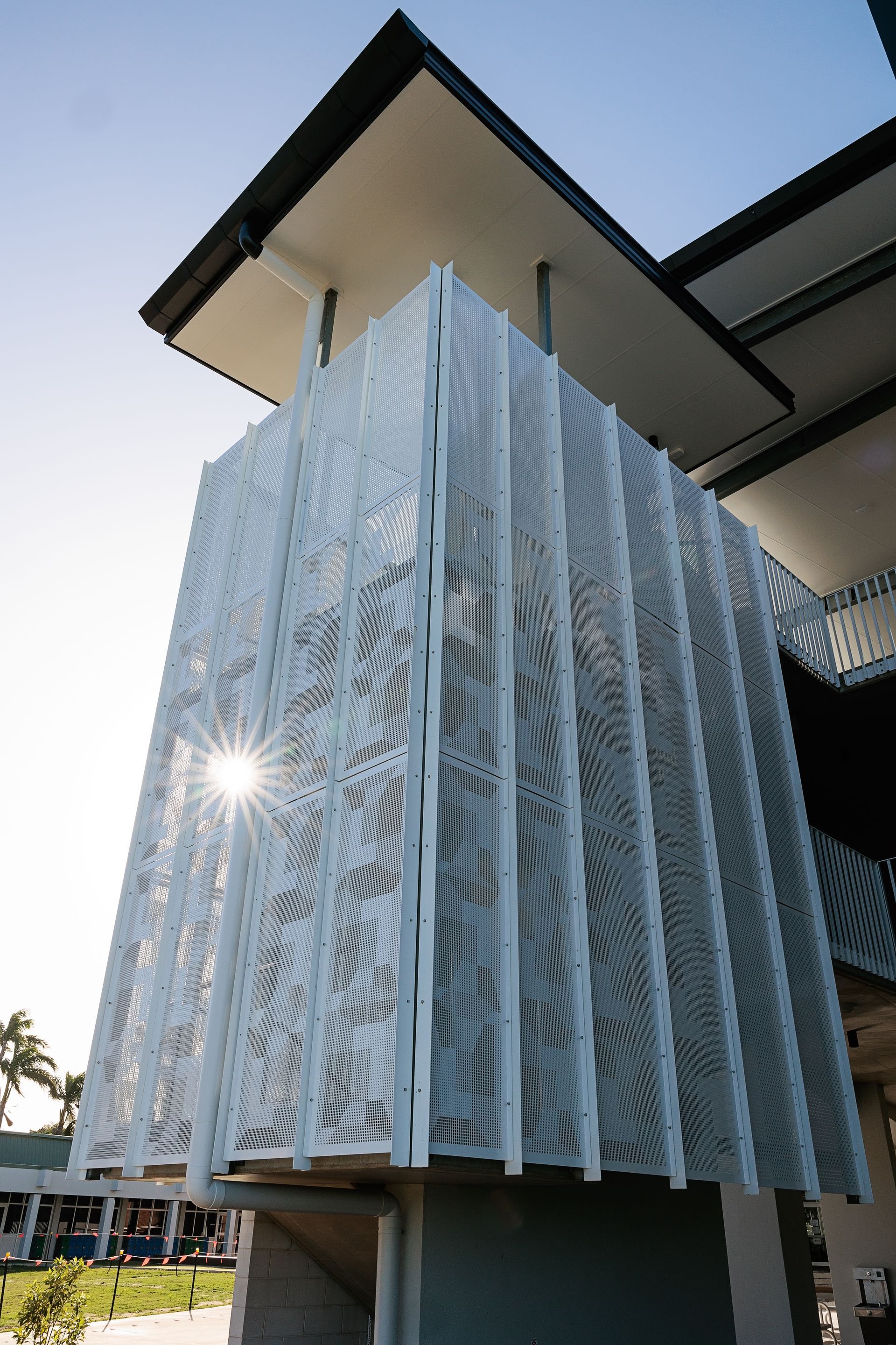 White Patterned Exterior Wall of a Modern Building — BOLD Architecture + Interior Design In Mackay, QLD
