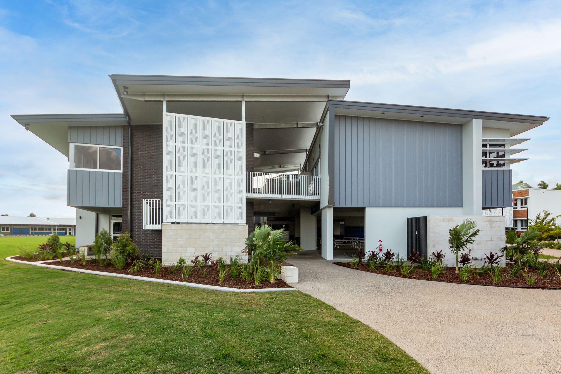 Modern Two-story Building With Gray and White Exterior — BOLD Architecture + Interior Design In Mackay, QLD