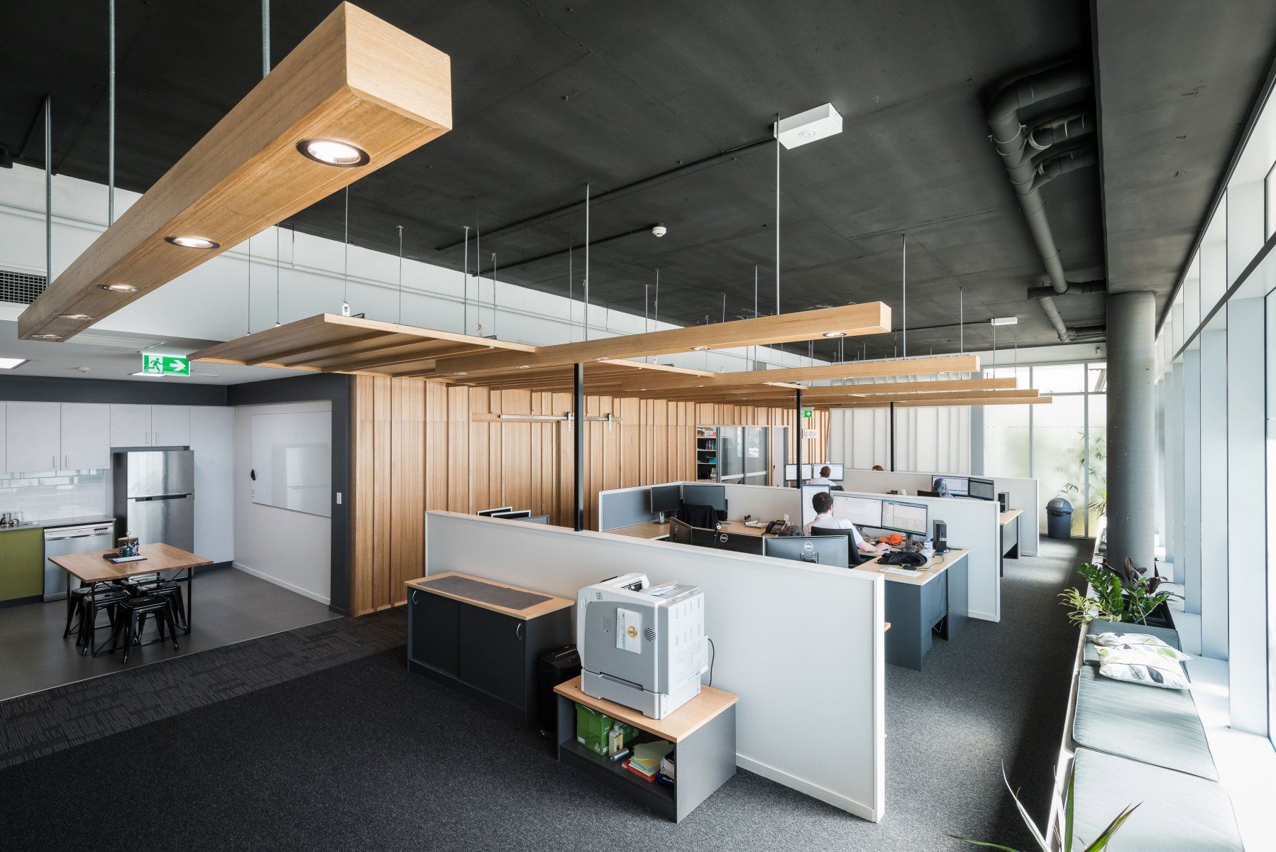 Modern Office Interior With Desks, Cubicles, and a Kitchenette Area — BOLD Architecture + Interior Design In Mackay, QLD