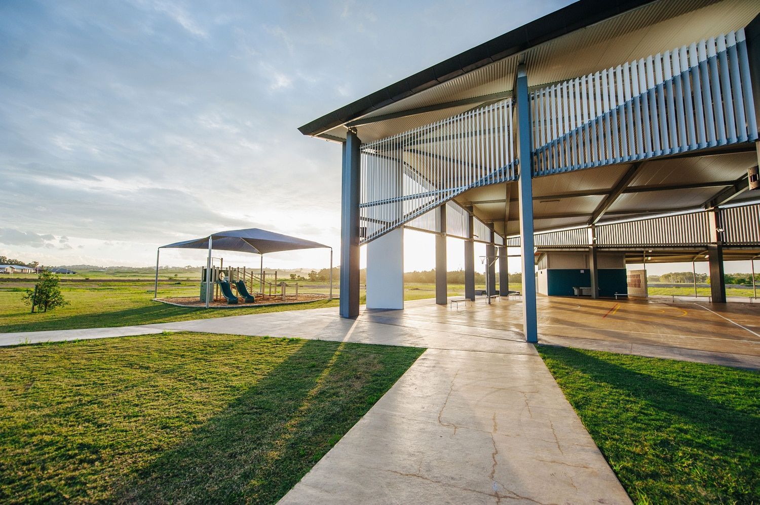 Open-air Pavilion With Slatted Facade, Path, Green Field — BOLD Architecture + Interior Design In Mackay, QLD