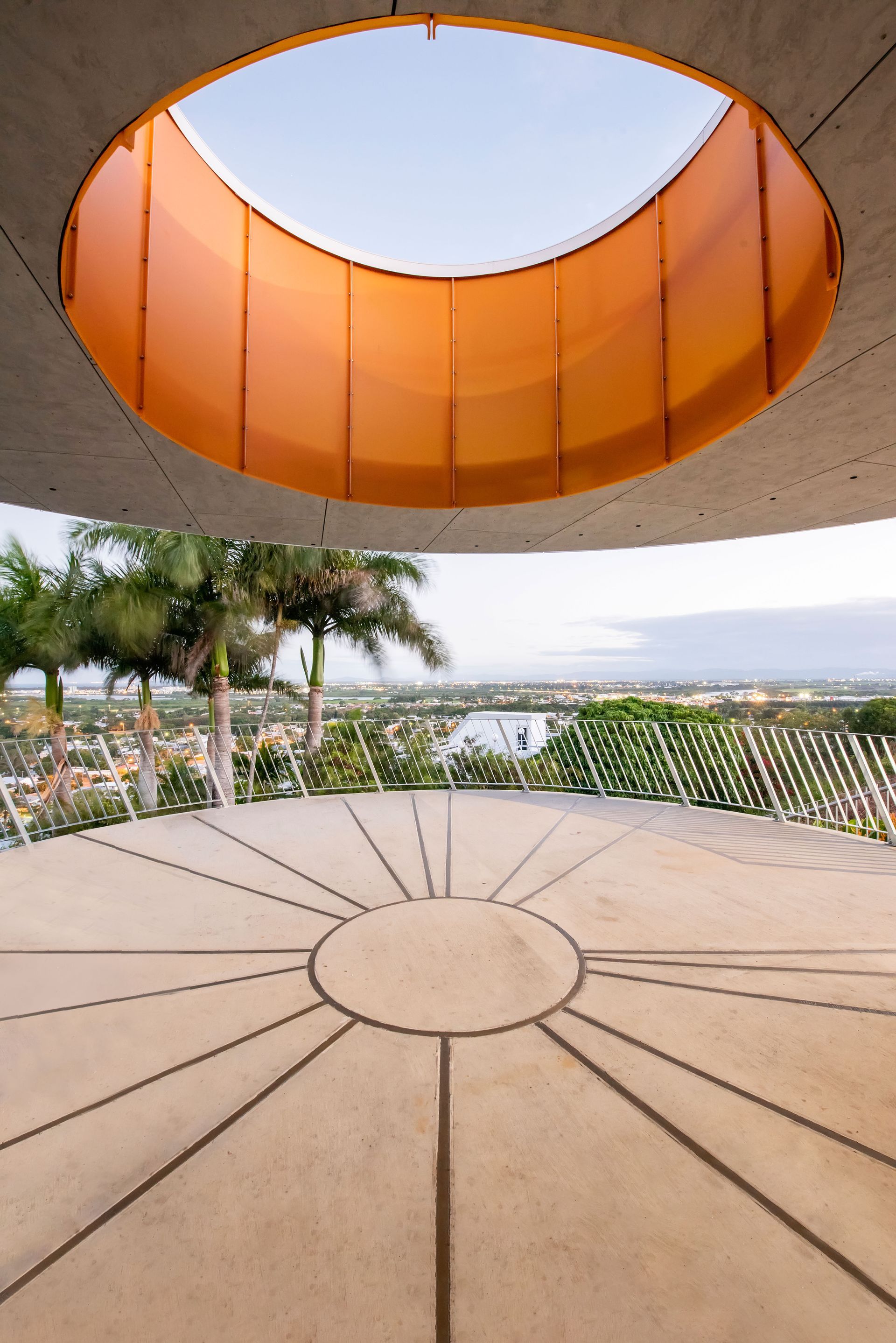 Circular Architectural Structure With an Orange Skylight and Radial Lines on the Floor — BOLD Architecture + Interior Design In Mackay, QLD