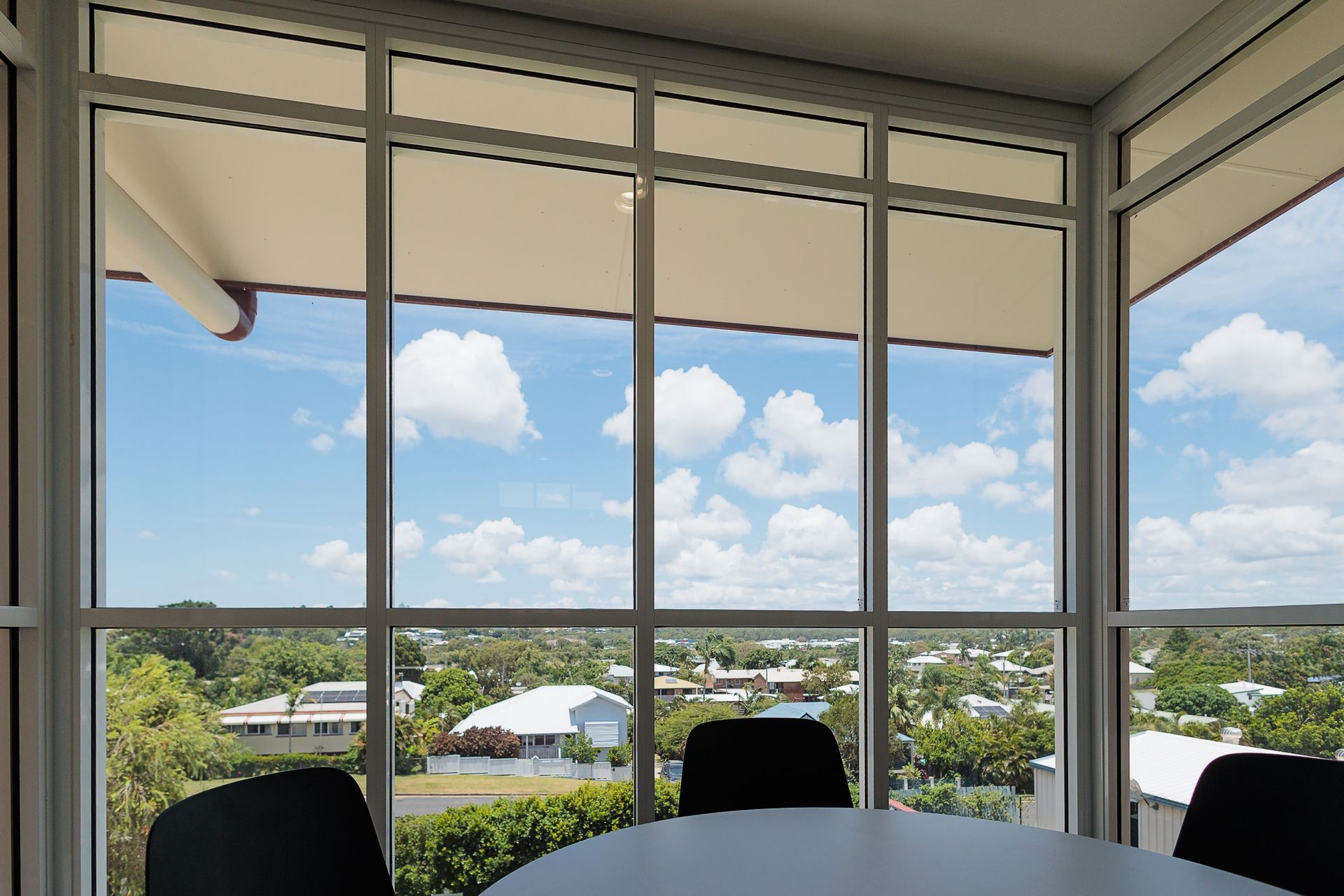 Office Windows Overlooking a Bright Blue Sky — BOLD Architecture + Interior Design In Mackay, QLD