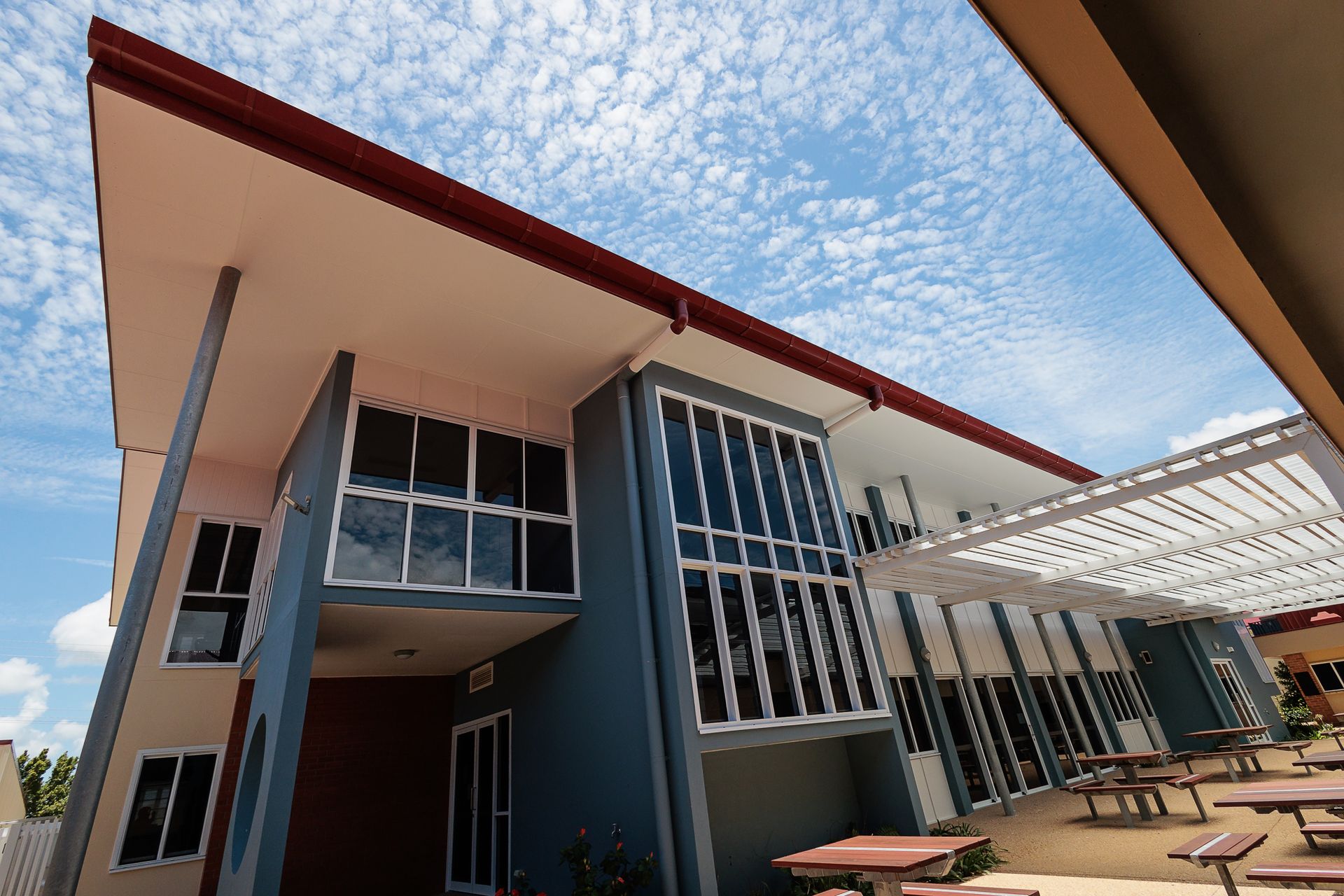 Modern Building Exterior With Red Roof — BOLD Architecture + Interior Design In Mackay, QLD