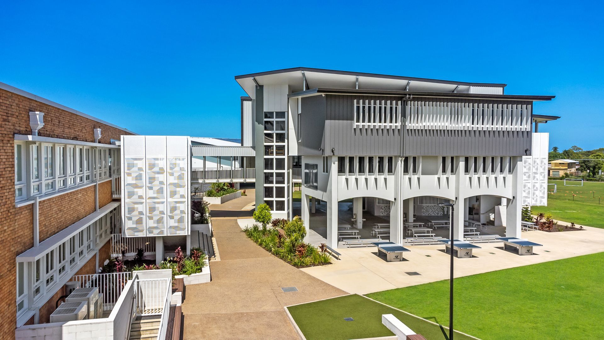 Modern, Multi-story Building With White and Gray Accents — BOLD Architecture + Interior Design In Mackay, QLD