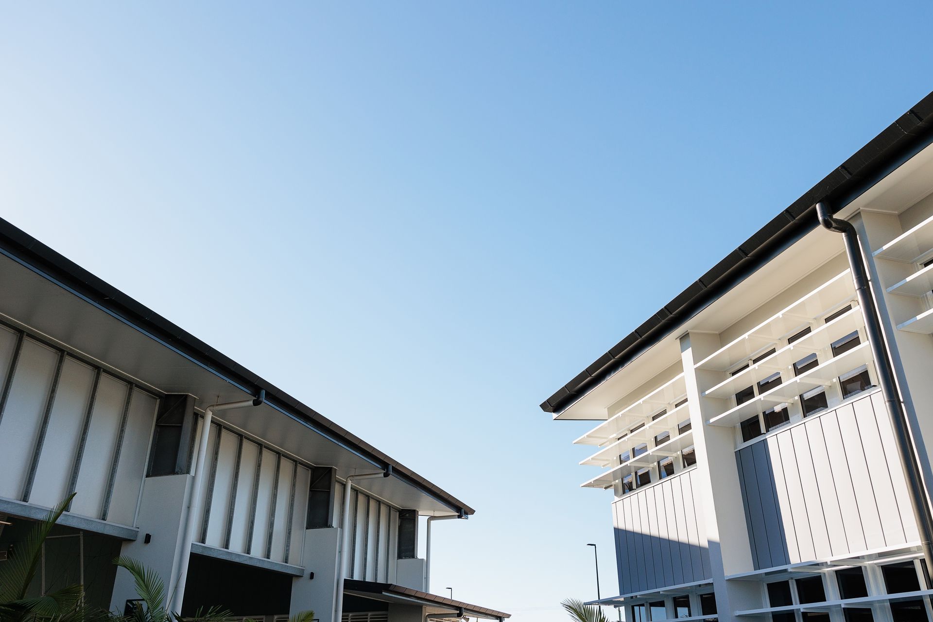 Buildings With White Walls and Black Roofs — BOLD Architecture + Interior Design In Mackay, QLD