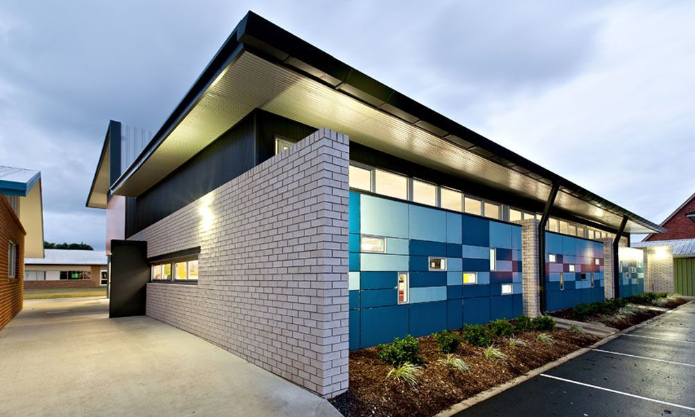 Modern Building With White Brick Wall and Blue Mosaic Panels — BOLD Architecture + Interior Design In Mackay, QLD