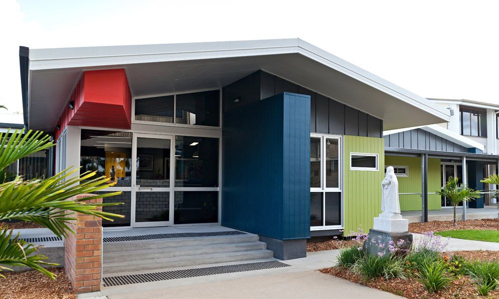 Modern School Building With Red, Green, and Blue Accents — BOLD Architecture + Interior Design In Mackay, QLD
