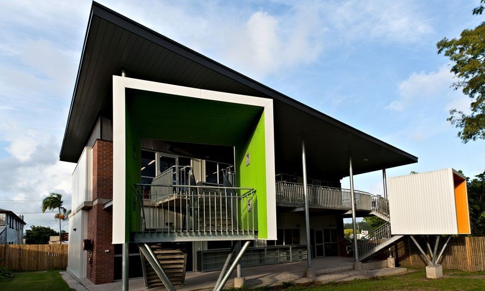 Modern Building With Lime Green Accent Cube and Black Angled Roof — BOLD Architecture + Interior Design In Mackay, QLD