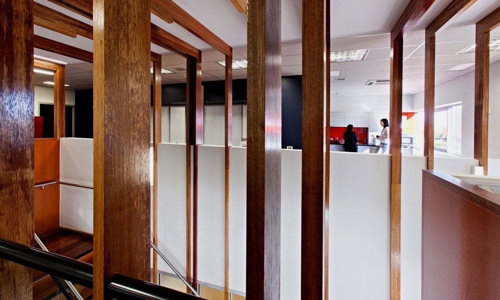 Office Interior With Wooden Dividers and White Walls — BOLD Architecture + Interior Design In Mackay, QLD