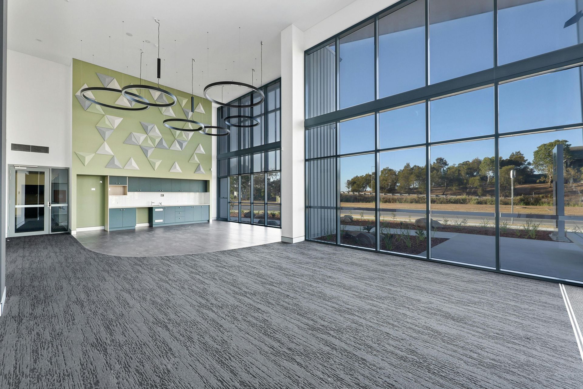 Modern Event Space With Large Windows Overlooking a Landscape — BOLD Architecture + Interior Design In Mackay, QLD