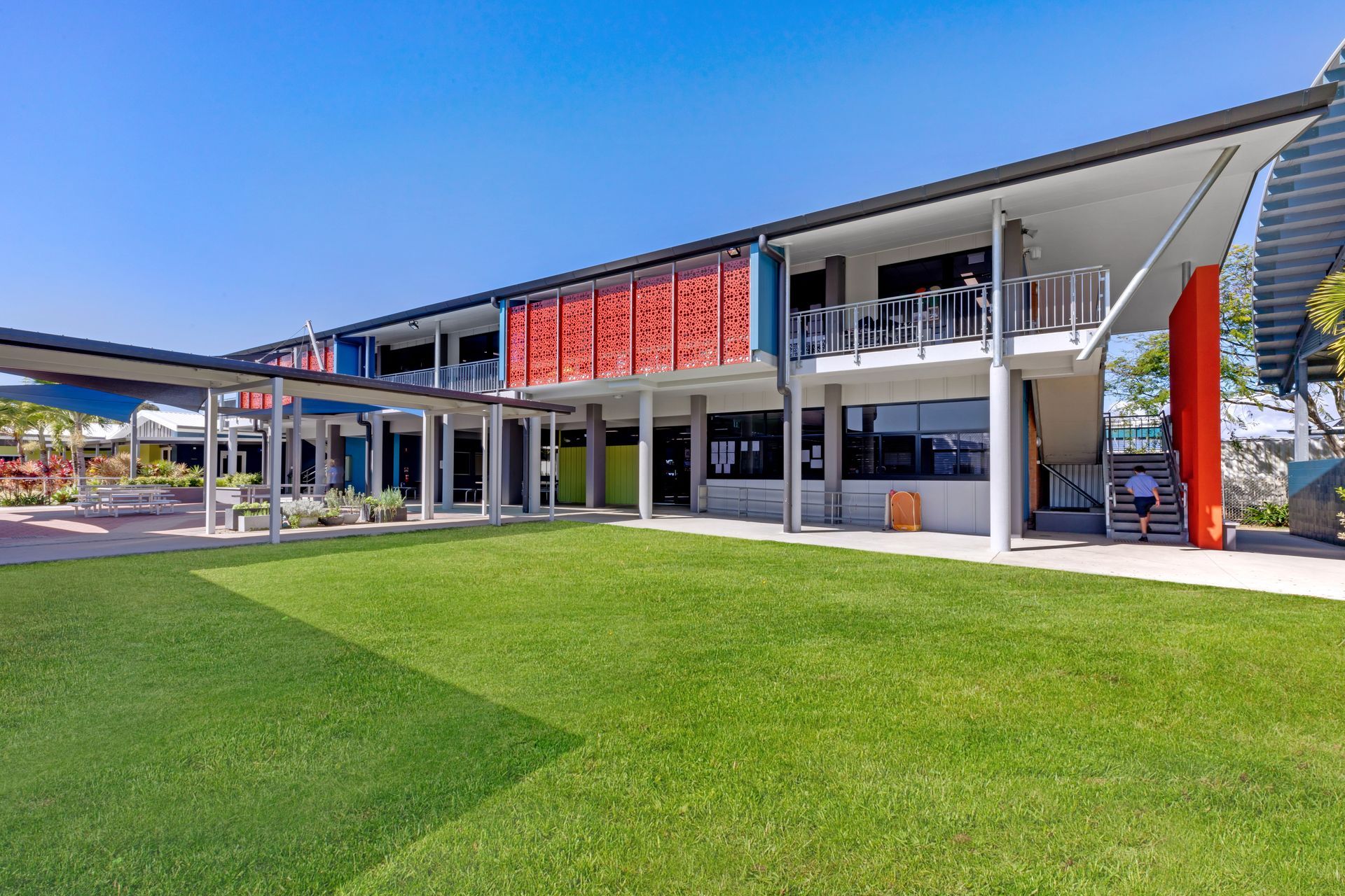 School Building With Green Lawn and Covered Walkways — BOLD Architecture + Interior Design In Mackay, QLD