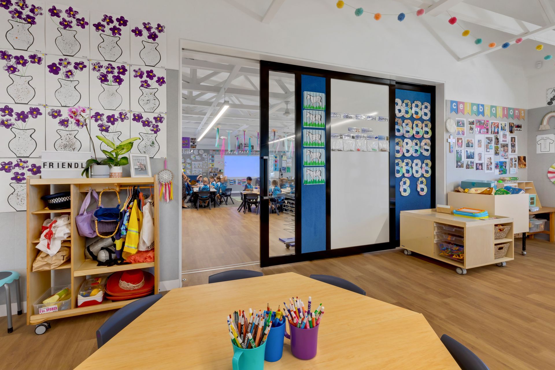 A Classroom With Children, Seen Through a Sliding Glass Door — BOLD Architecture + Interior Design In Mackay, QLD