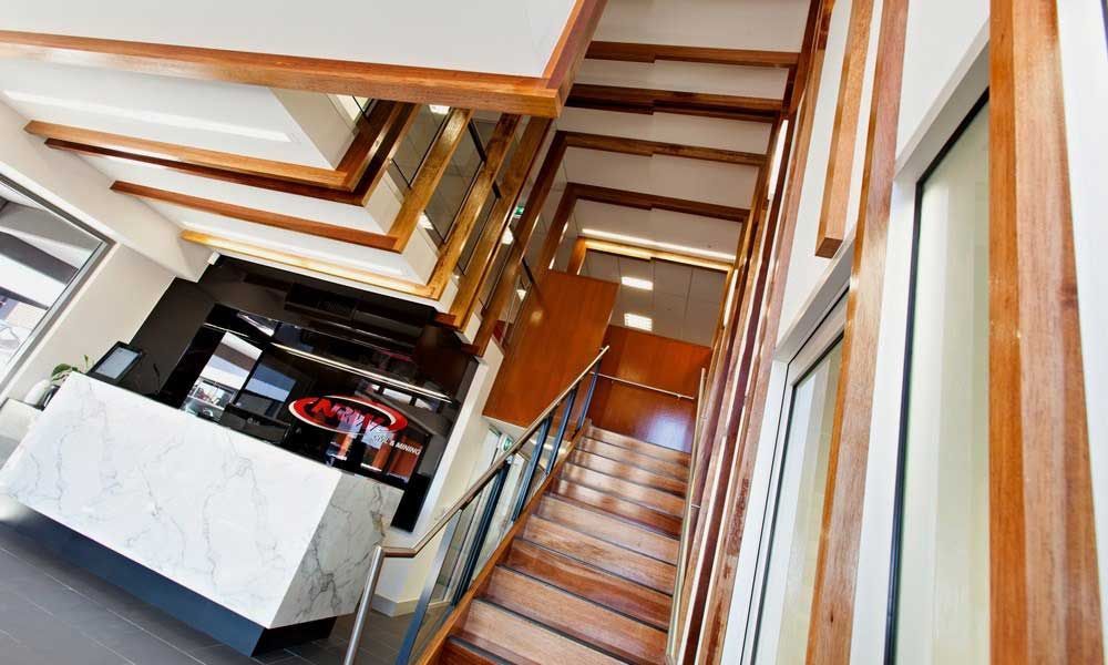 A Staircase Leading Up To The Second Floor Of A Building — BOLD Architecture + Interior Design In Mackay, QLD