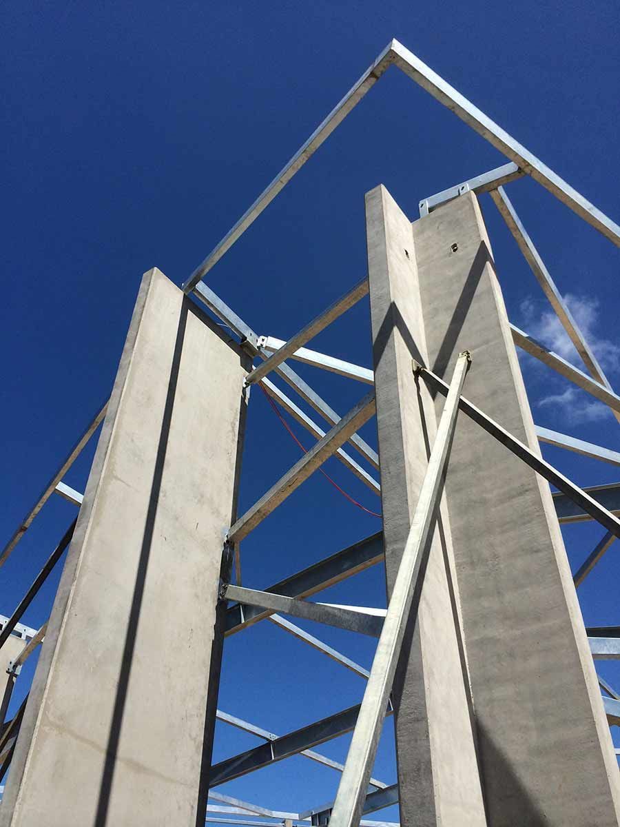 A Building Under Construction With A Blue Sky In The Background — BOLD Architecture + Interior Design In Mackay, QLD