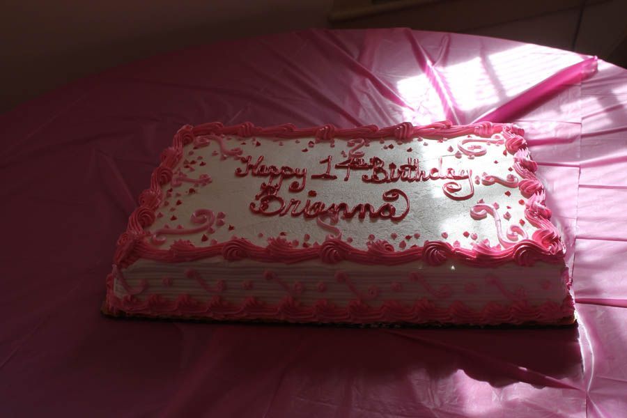 Pink frosted cake with 
