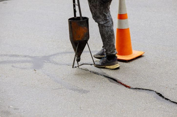 Fixing Crumbling Asphalt Driveways: Causes & Solutions