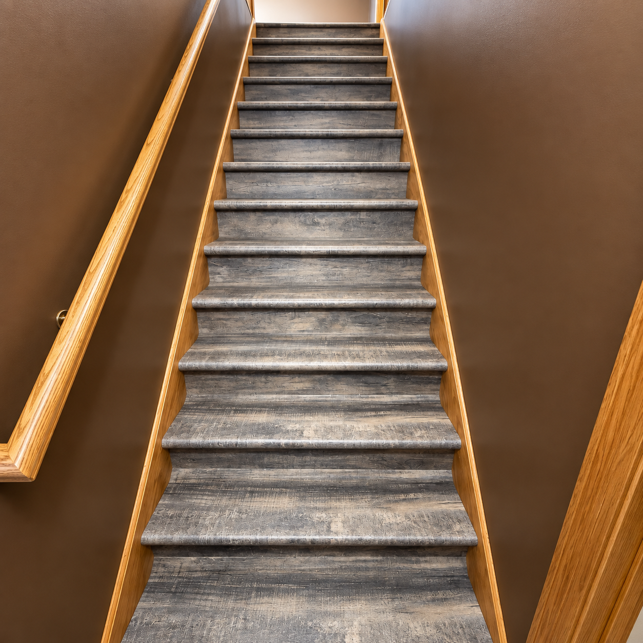 Stair tread and riser flooring installation in Andover MN by Pro Floors Inc