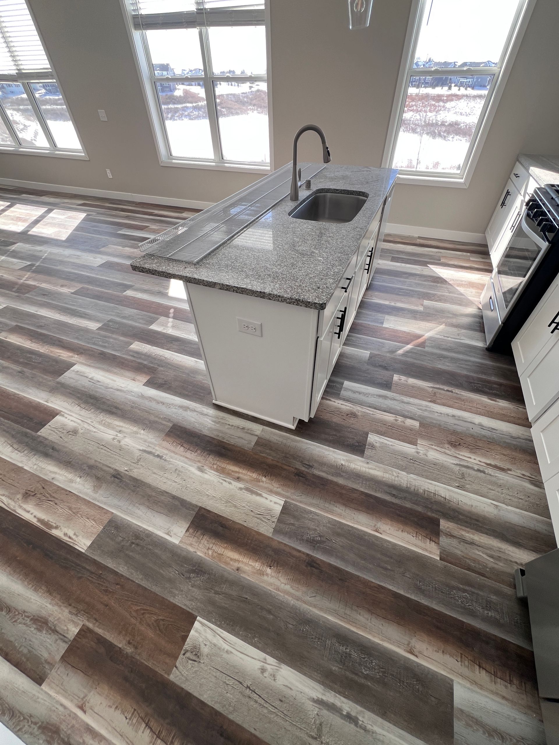 Luxury vinyl plank flooring installation in Blaine MN