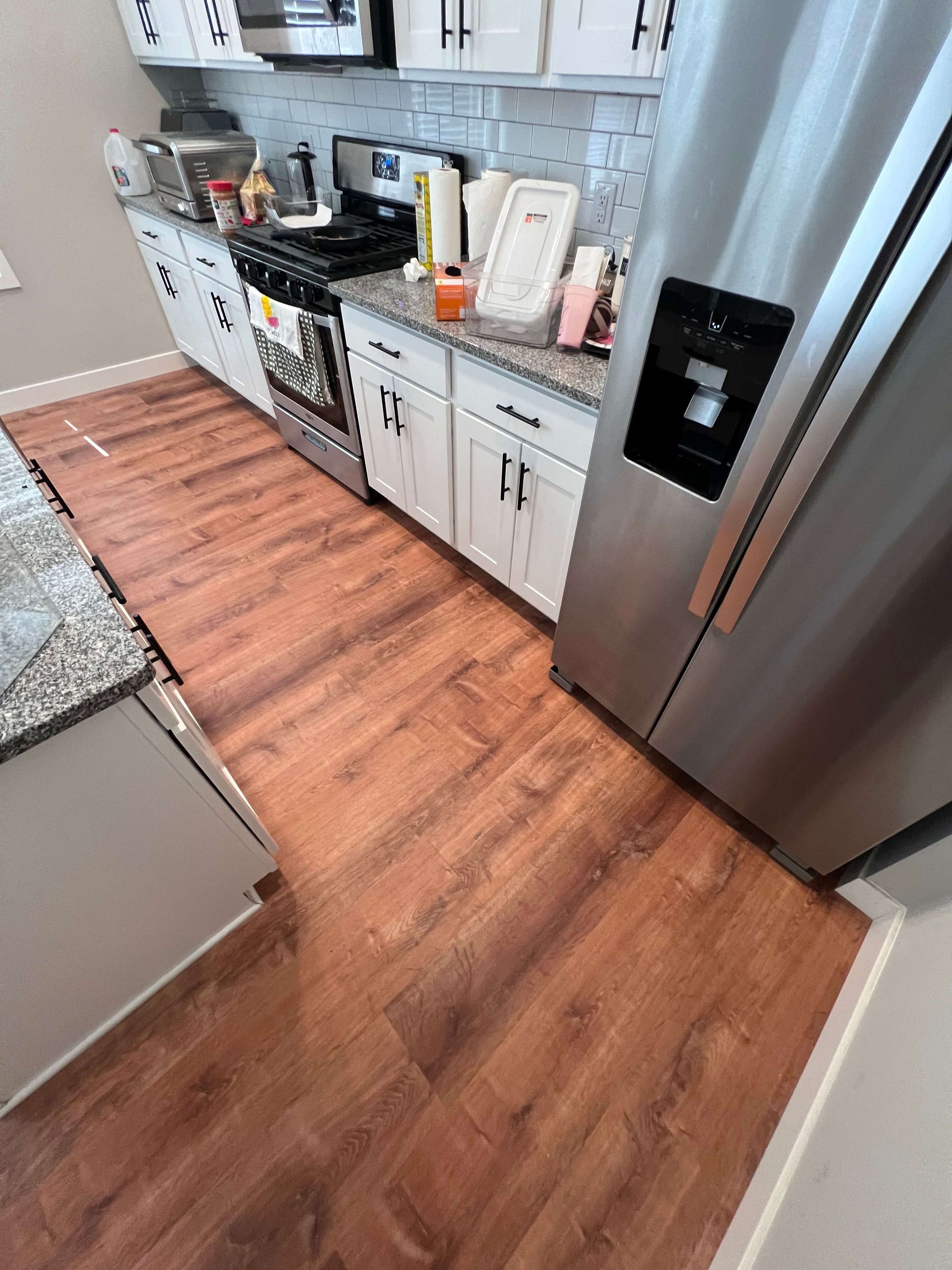 LVP stair tread installation project in Blaine Minnesota
