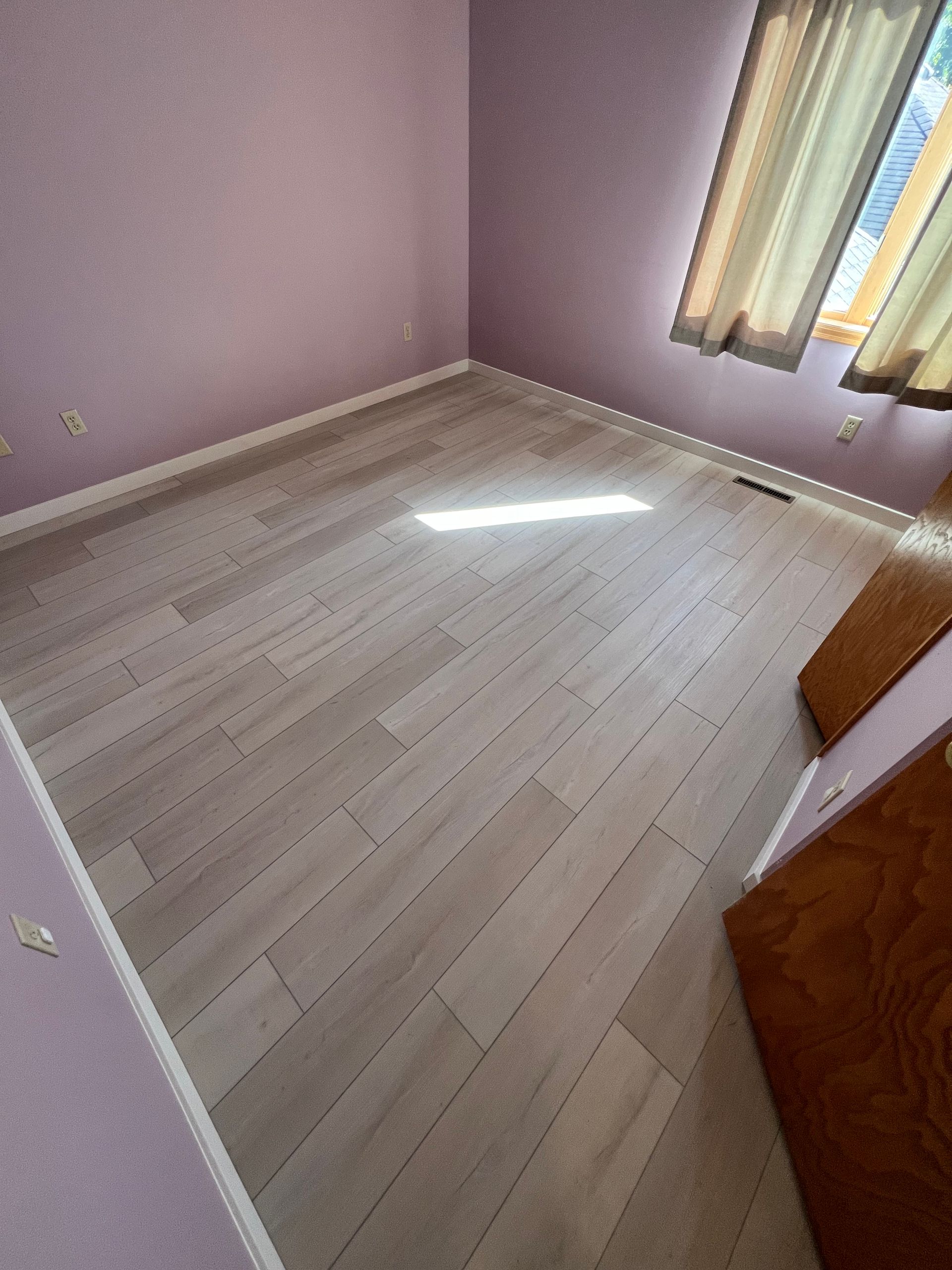 Luxury vinyl plank flooring installation in Plymouth MN home