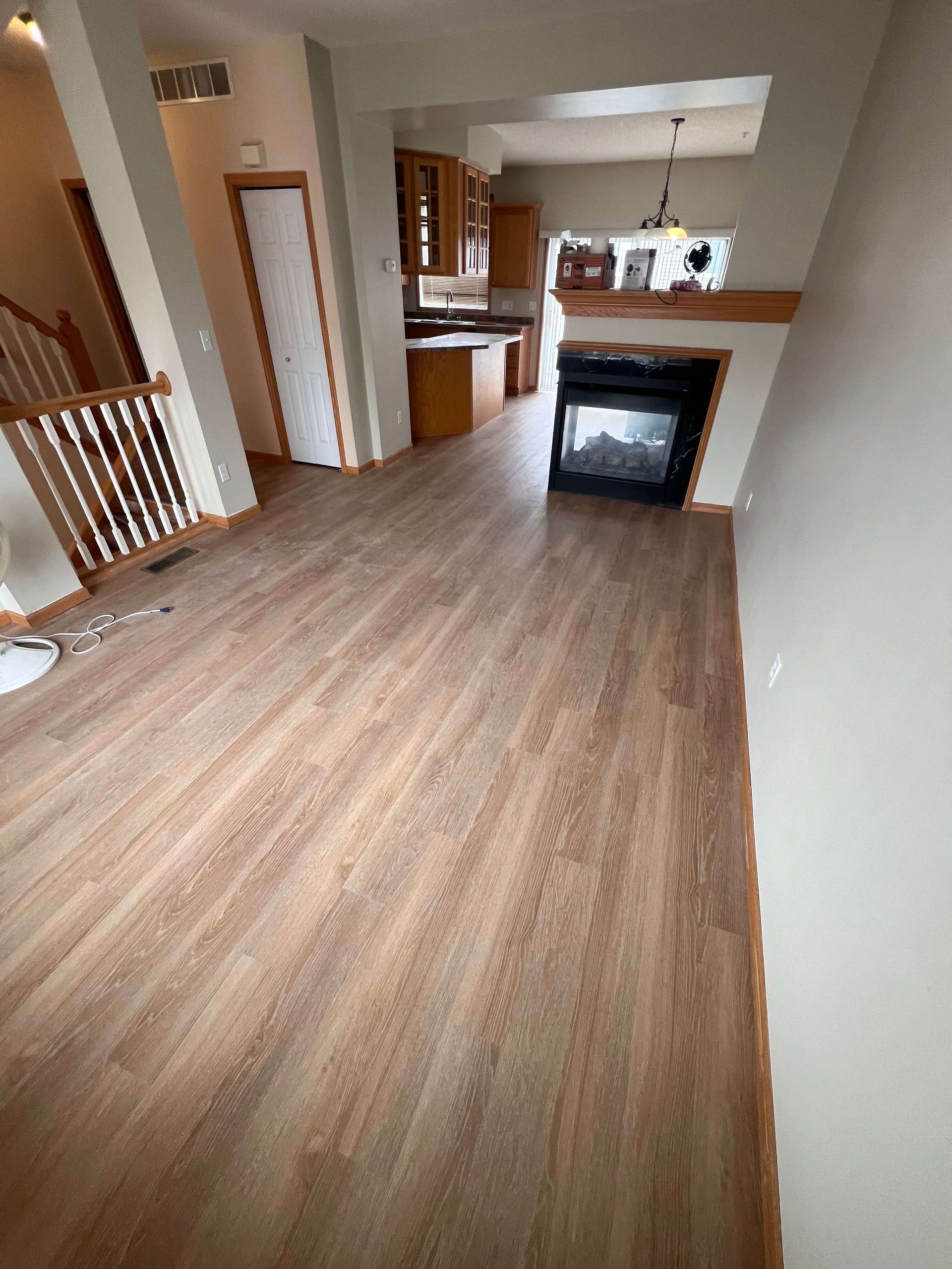 Flooring installation in living room, Anoka MN