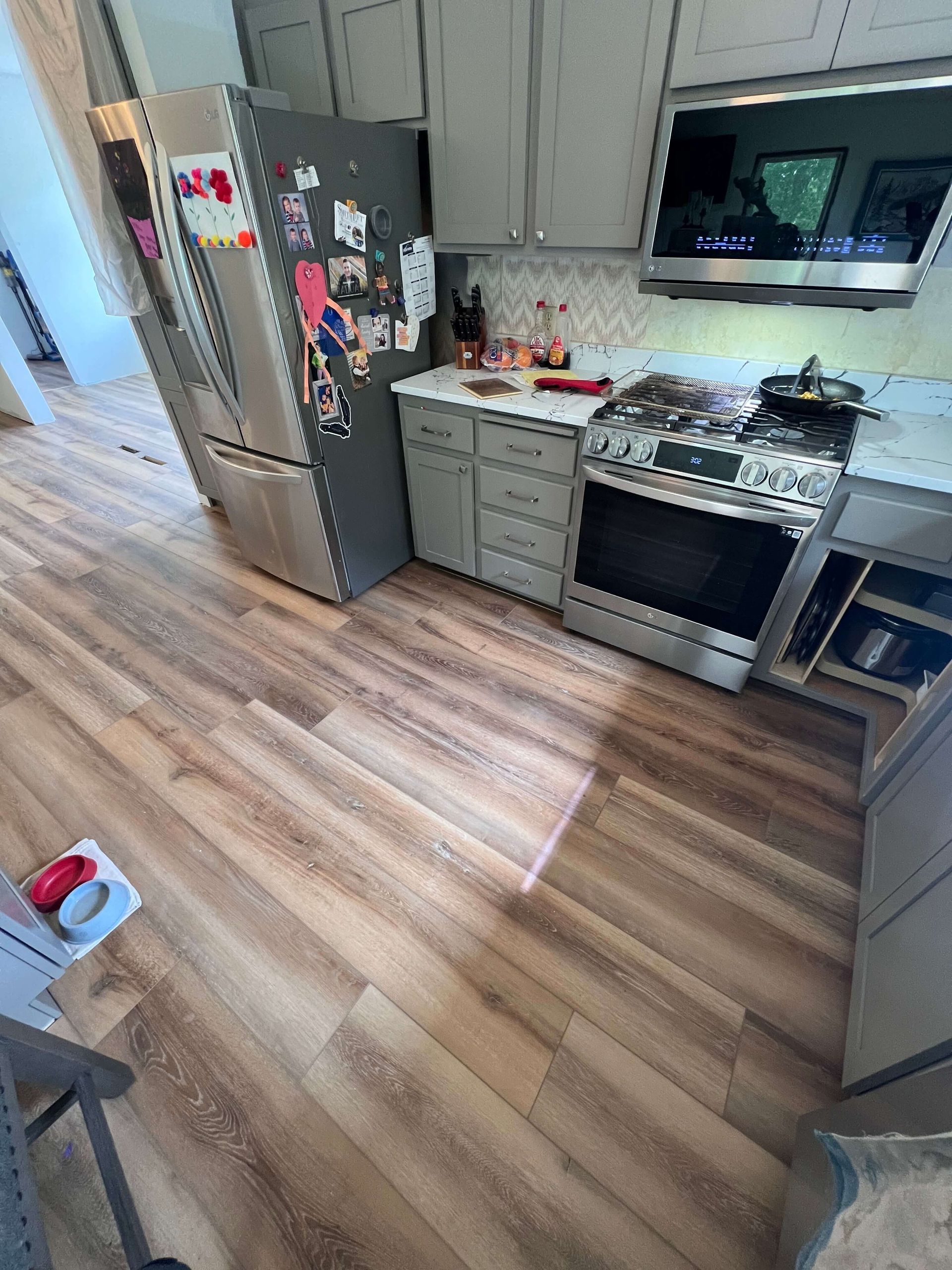 Living room laminate flooring installed in Ham Lake MN