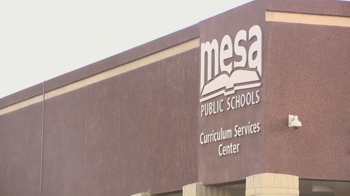 Mesa Public Schools Clum & Center sign on a brown building exterior