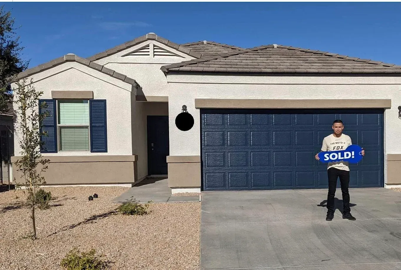 First-time home buyer in front of his brand new home. Florence,Arizona