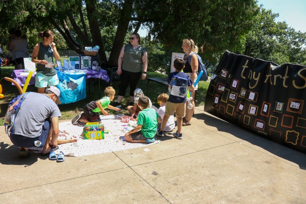 Children create art outdoors at 