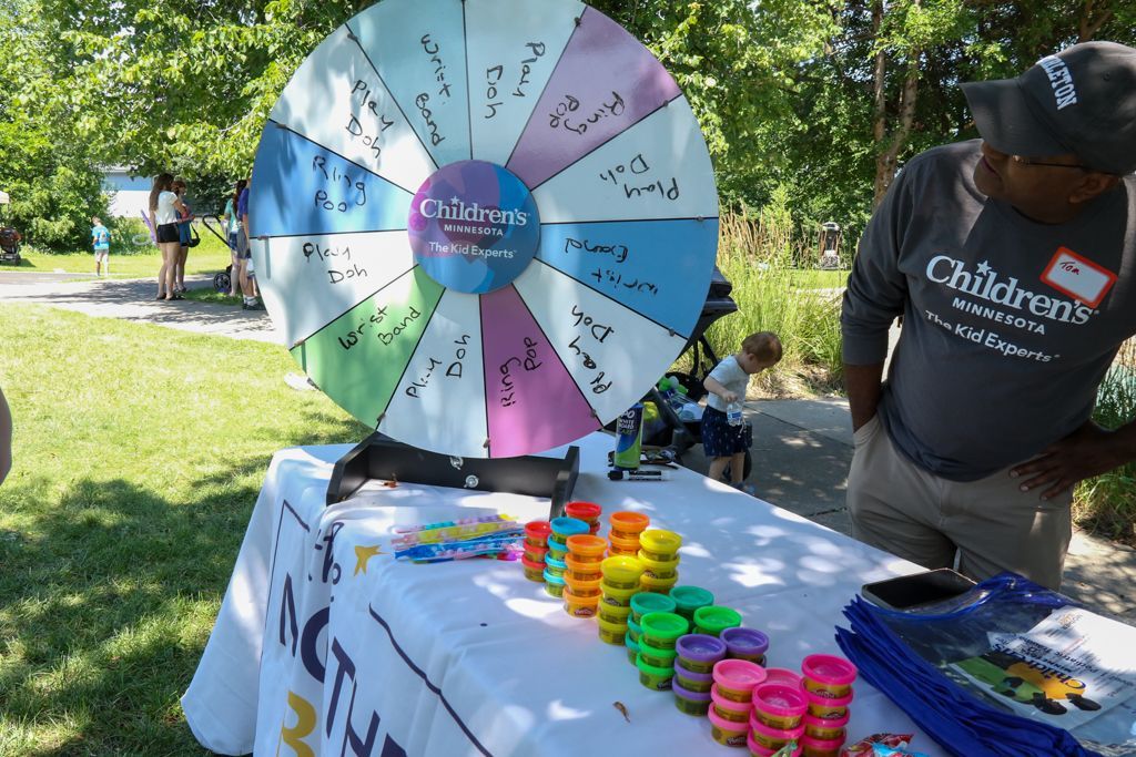 Spin wheel at a children's event. Bubbles and a person in a 