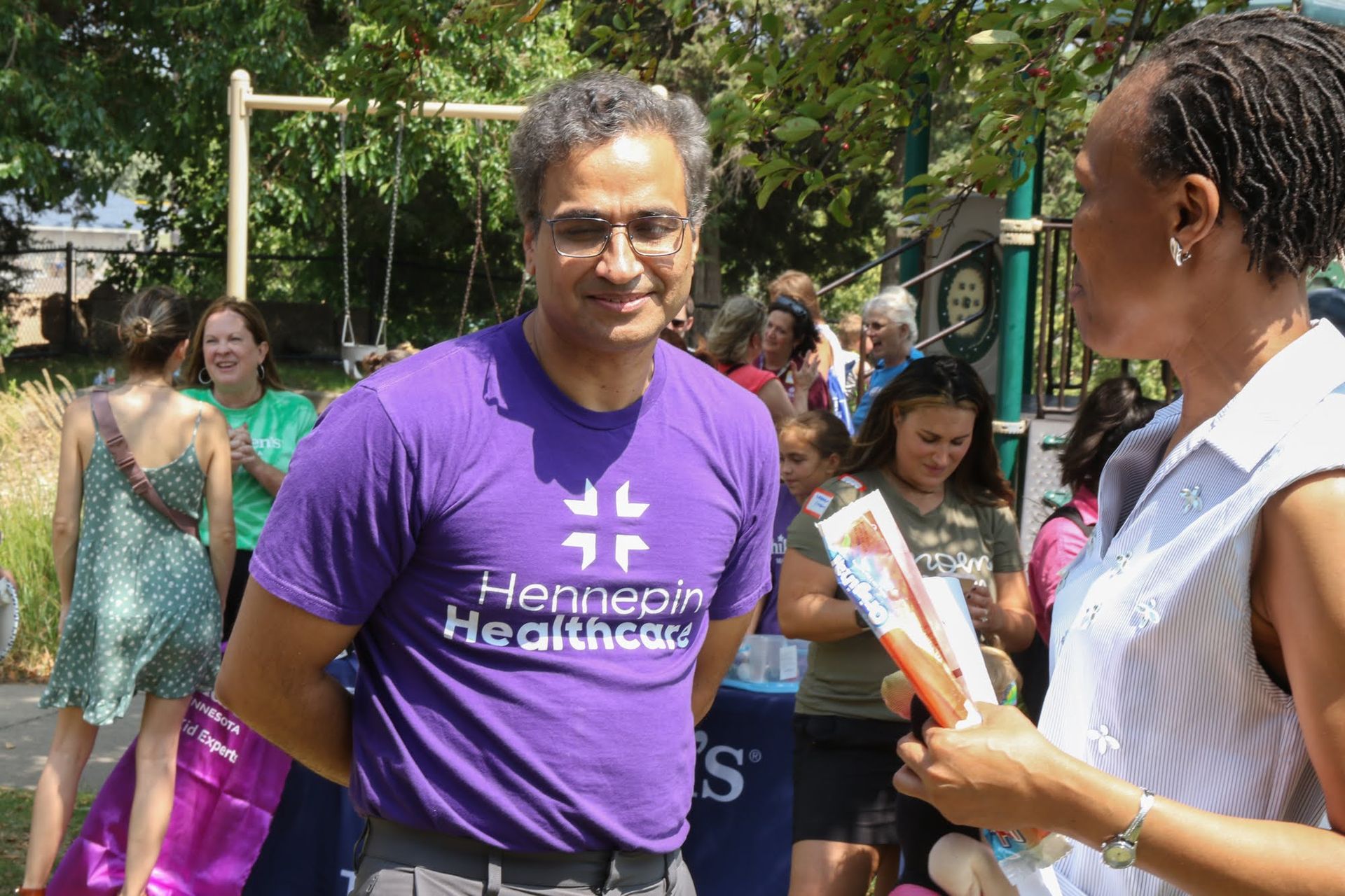 Man in purple shirt with 