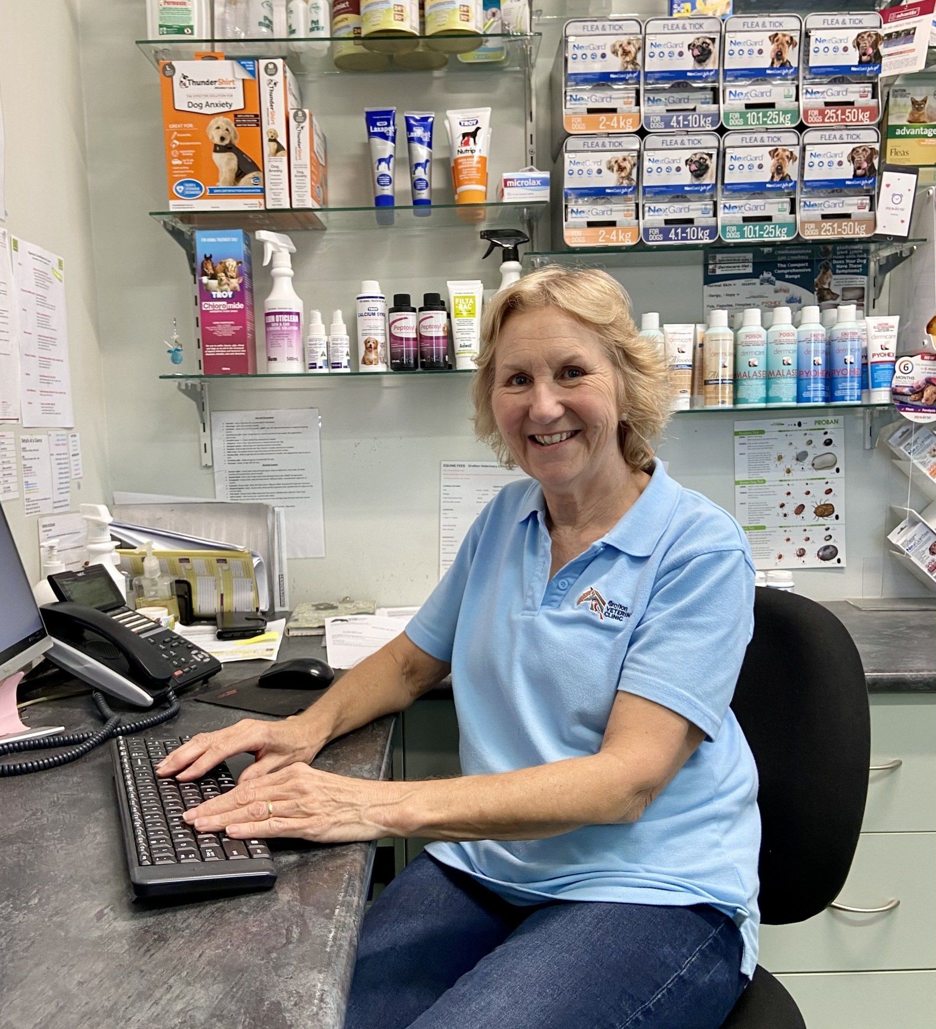 Lady sitting at desk - Grafton Veterinary Clinic
