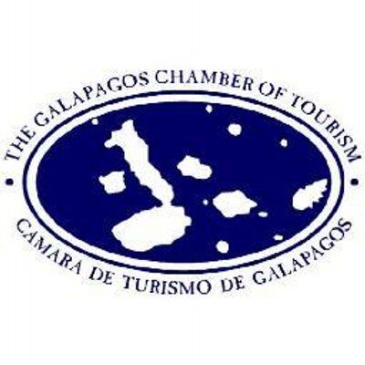Logo of The Galapagos Chamber of Tourism, blue oval with island silhouettes and bilingual text