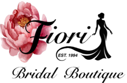 Fiori Bridal Boutique logo with pink flower, black silhouette bride, and “EST. 1994” text