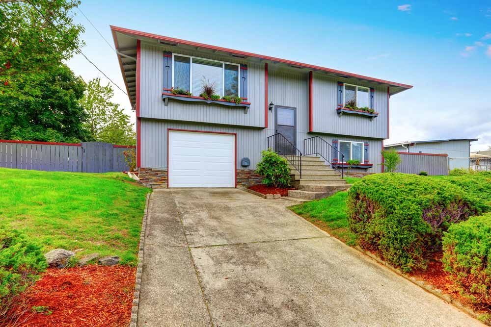 Two-story Gray House With Red Trim, Flower Boxes — Easy Mix Concrete In Wyong, NSW