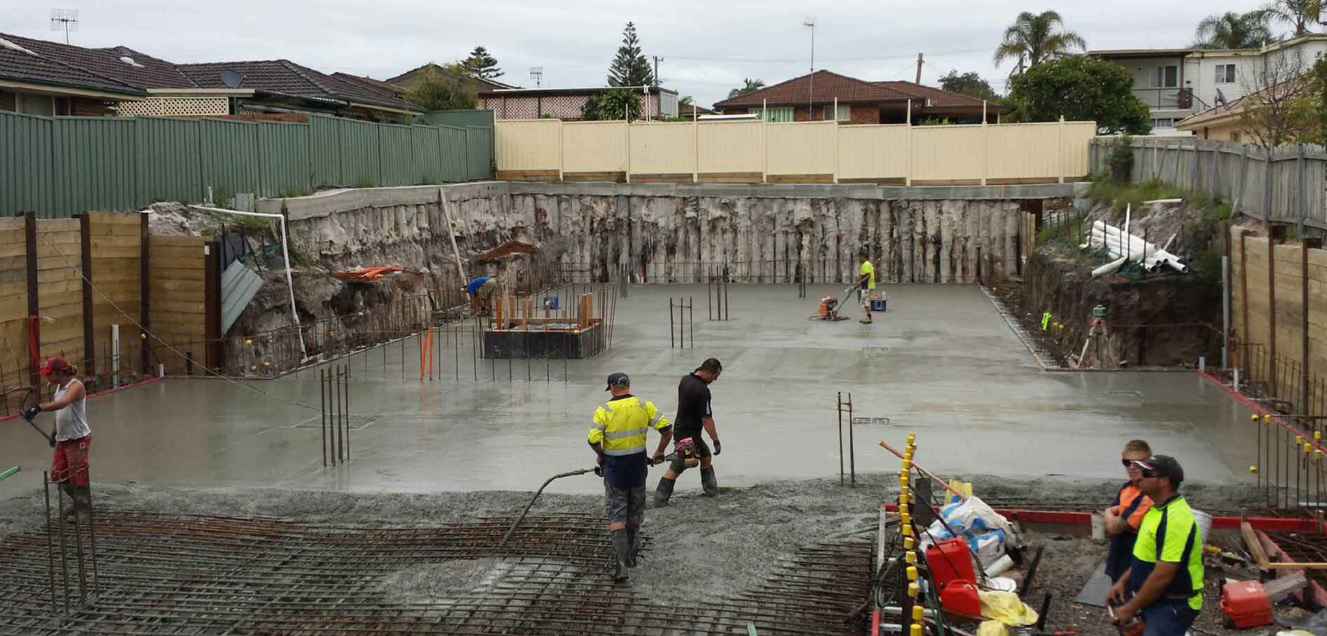 Several Concrete Layers Working on a Large Site — Easy Mix Concrete In Berkeley Vale, NSW