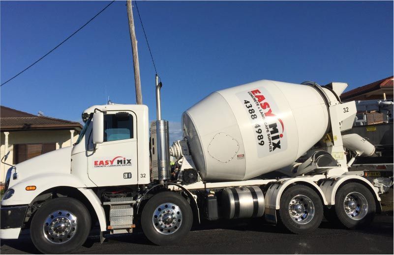 White Easy Mix Concrete Truck on a Street Today — Easy Mix Concrete In Berkeley Vale, NSW