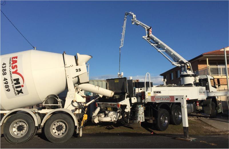Concrete Mixing Truck With an Extended Boom — Easy Mix Concrete In Berkeley Vale, NSW