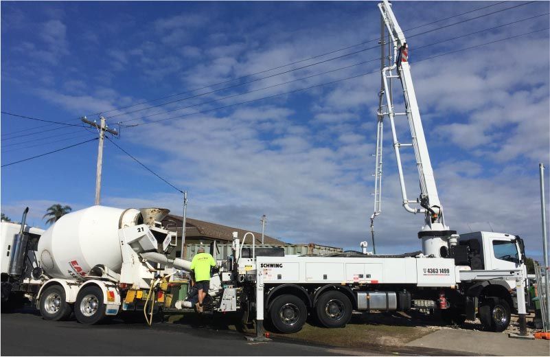 A Concrete Mixer Truck and a Concrete Pump Truck — Easy Mix Concrete in Berkeley Vale, NSW