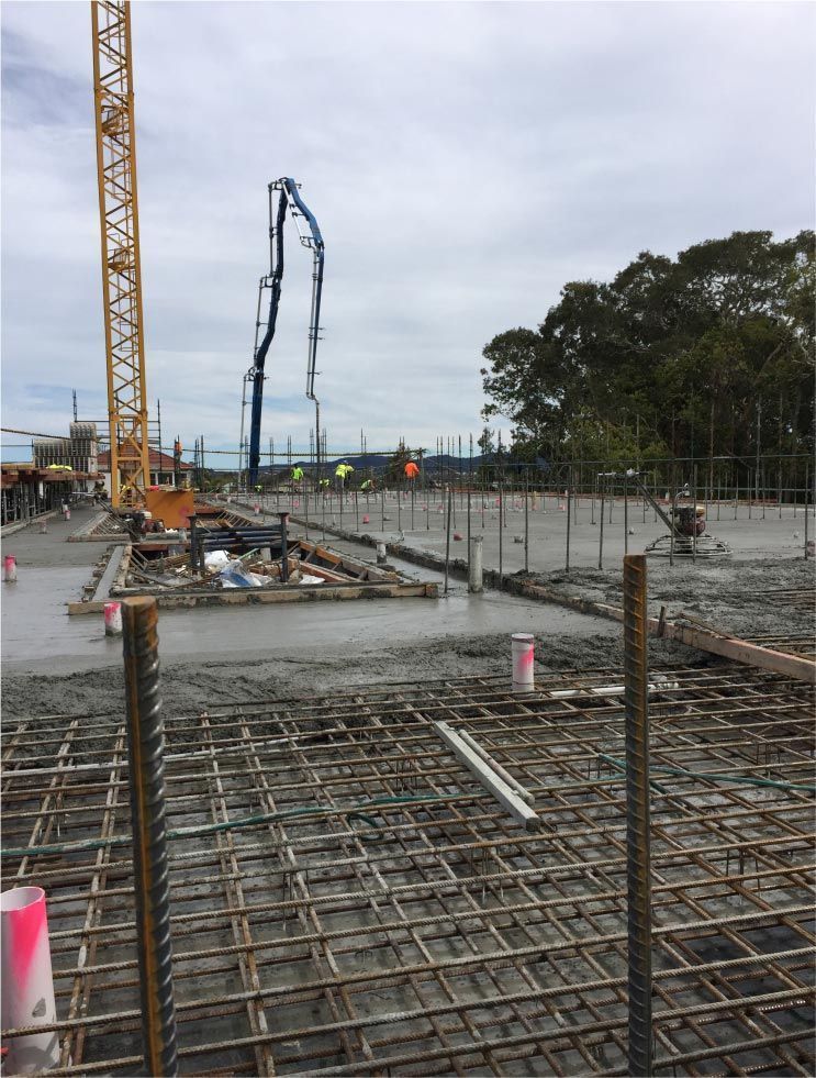 Concrete Being Poured Over Rebar Framework — Easy Mix Concrete In Berkeley Vale, NSW