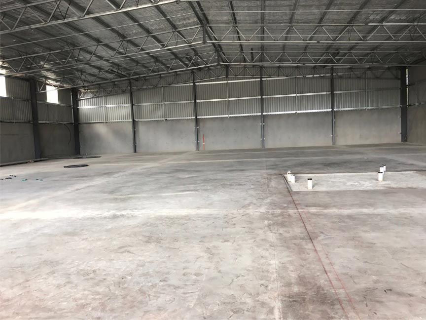 Interior of a Large, Empty Industrial Building — Easy Mix Concrete in Berkeley Vale, NSW